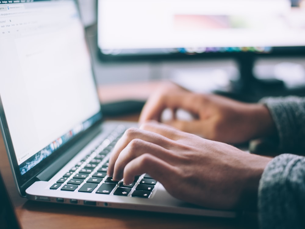 Person searching for local places on a laptop